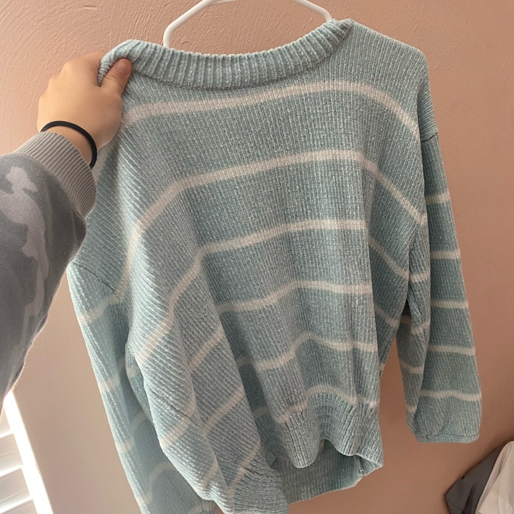 light blue sweater